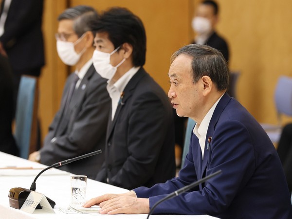 Japan's PM Yoshihide Suga announcing extension of state of emergency till August 31 (Twitter/PM's Office of Japan)