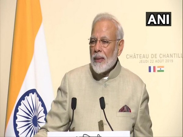 M Narendra Modi speaking during a joint statement with France President in Chantilly