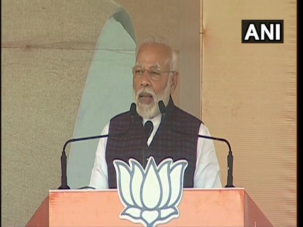 Prime Minister Narendra Modi addressing a public rally in Dwarka on Tuesday. 