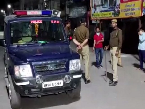 Police providing assistance to a Lakhanpur resident  