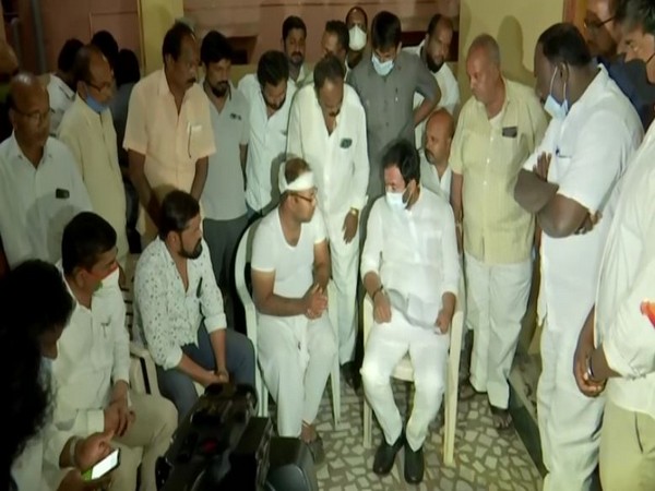 Visual of Telangana Minister G Kishan Reddy along with the affected family (Photo/ANI)