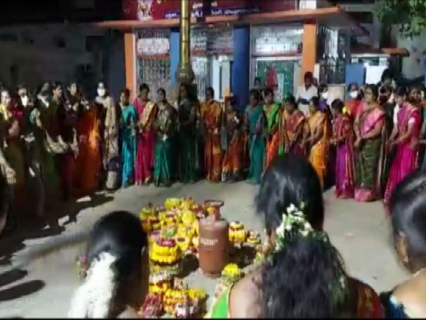 Visual of 'Bathukamma' festival and protest againt LPG price hike (Photo/ANI) 
