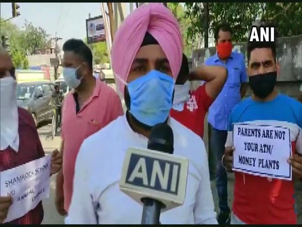Parents of students of a private school in Ludhiana protest against fee hike. Photo/ ANI
