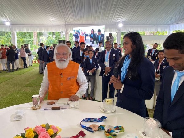 Prime Minister Narendra Modi with badminton player  PV Sindhu.