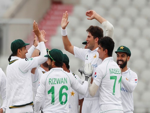Pakistan players celebrate after taking a wicket in the first Test against NZ