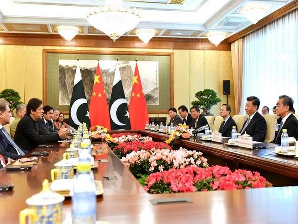 Pakistan Prime Minister Imran Khan along with Chinese President Xi Jinping here on Wednesday. (Photo/Reuters)