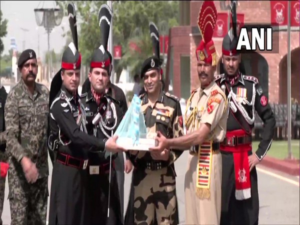 Pakistan Rangers and Border Security Force (BSF) on Saturday exchanged sweets at Attari-Wagah border near Amritsar, Punjab