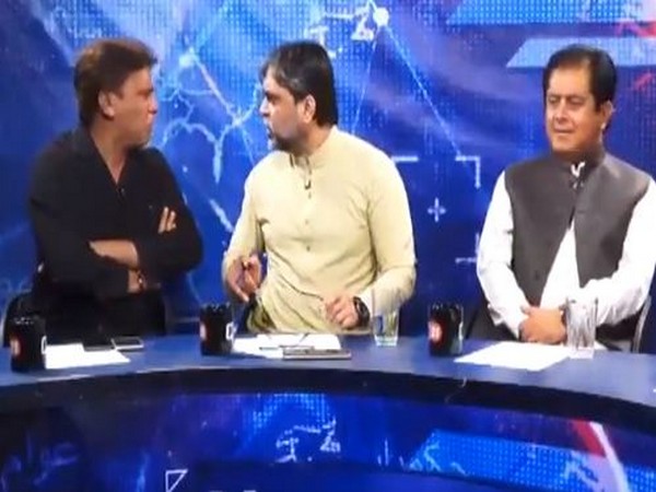 Imtiaz Khan Faran (extreme left) and Masroor Ali Siyal (middle) seen engaging in a heated debate at a TV talk show