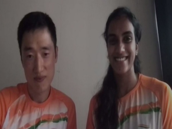 Coach Park Tae-sang with shuttler PV Sindhu 
