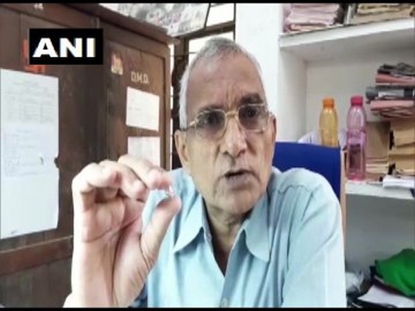 RK Pandey, District Diamond Officer with the diamond. Photo/ANI