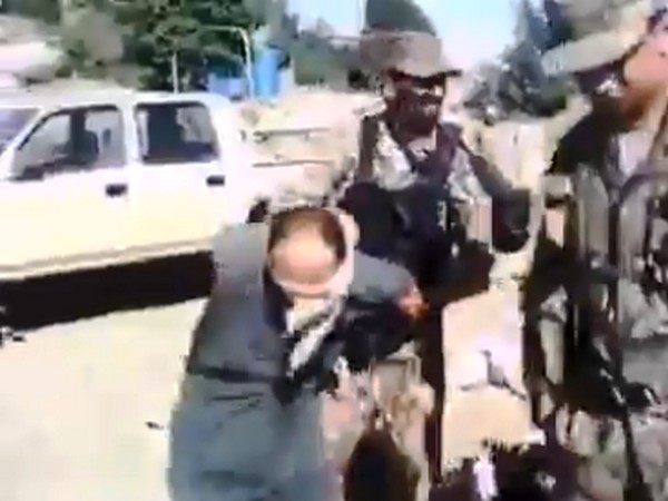 Video showing Pakistan Army personnel kicking a blindfolded man.
