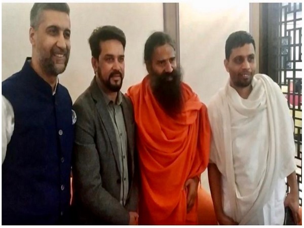 Nikhil Nanda, Hardeep Singh Puri, Swami Baba Ramdev, and Acharya Balkrishna
