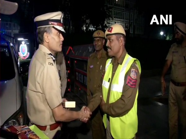 Delhi Police Commissioner Amulya Patnaik  meeting personnel deployed on duty on Diwali night. (Photo/ANI)