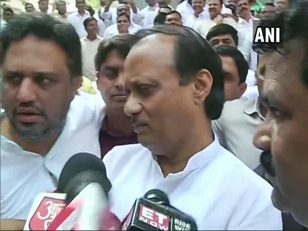 NCP leader Ajit Pawar speaking to media reporters in Mumbai on Wednesday. Photo/ANI