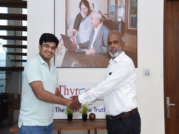 Siddharth Shah (left) and A Velumani after signing the agreement of acquisition