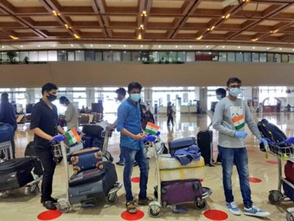 Stranded Indians in Manila before departure to Chennai and Visakhapatnam, on Tuesday.