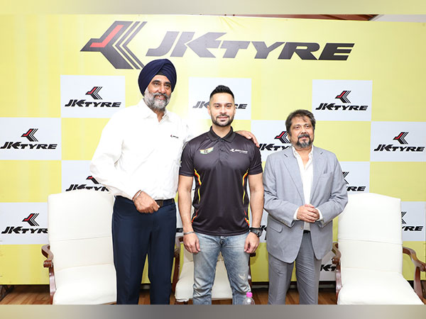 India's rally driver Gaurav Gill (In centre) with his JK Tyre team (Image: JK Tyre Media)