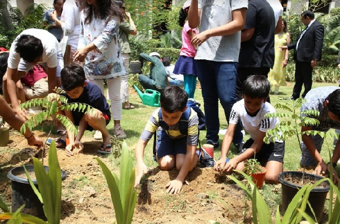Plantation drive by residents on the occasion of World Environment Day at The Magnolias, DLF5, Gurugram
