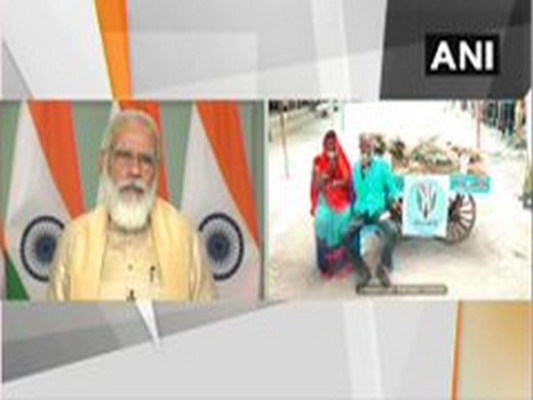 Prime Minister Narendra Modi interacting with street vendors from Madhya Pradesh through video conferencing on Wednesday. [Photo/ANI]
