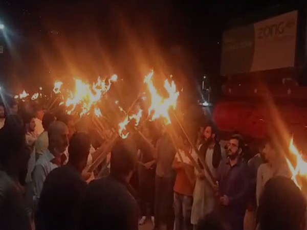 Massive protests and a torch rally was held in Muzaffarabad city of Pakistan occupied Kashmir (Photo/ANI)