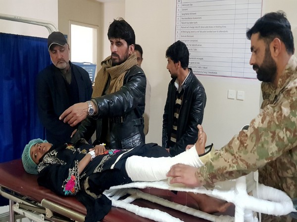 Samina Bibi receiving treatment after being airlifted out of the avalanche area