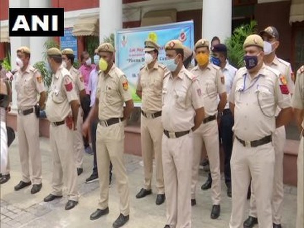 Policemen who have recovered from COVID-19 at Delhi's Lok Nayak Hospital.