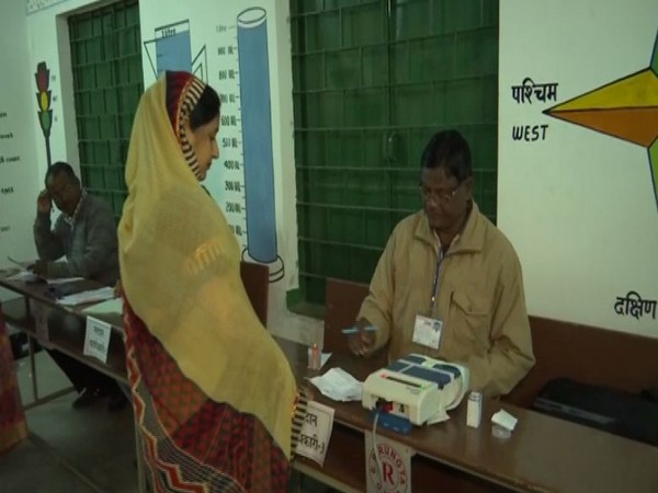 A woman casting her vote in Jharkhand during second phase of polling in the state on Saturday.