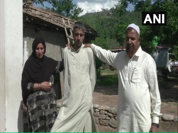 Mohd Ilyas (in middle) with his parents in Pooch, Jammu and Kashmir.