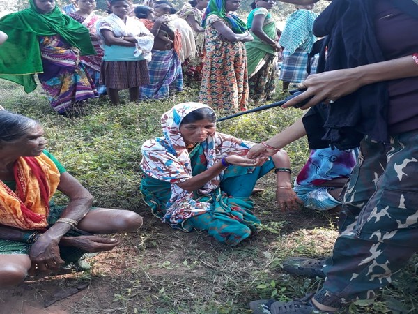 Villagers meet with the security officials at Potali camp