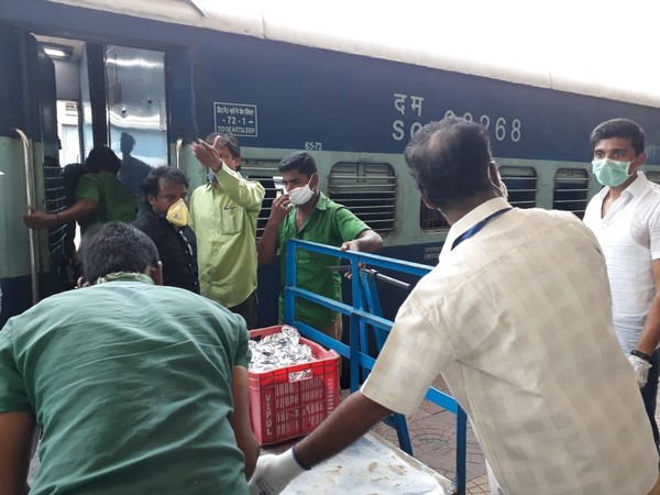  Catering services being provided by the South Central Railway (SCR) official at one of the Shramik Special Trains.
