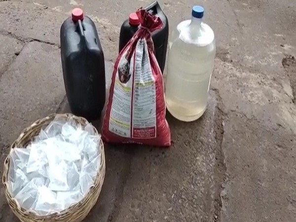 Liquor allegedly seized by Special Enforcement Bureau in Vizianagaram in a search operation conducted at two places in Parvathipuram, Andhra Pradesh. Photo/ANI