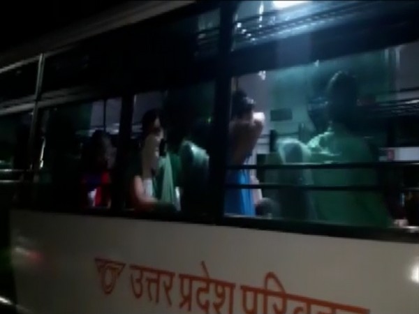 Visuals of students in a bus. 