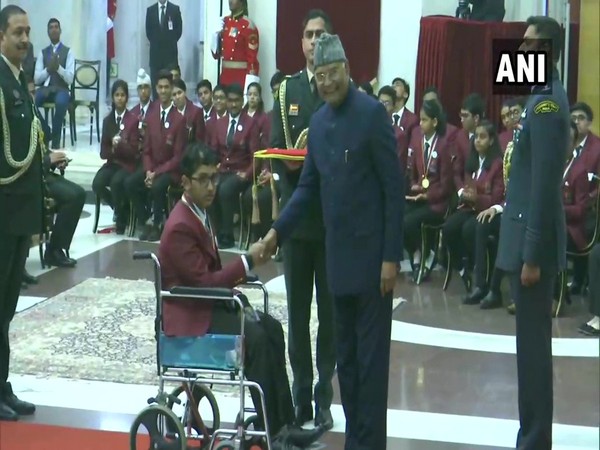 President Ram Nath Kovind felicitating a child at Rashtrapati Bhavan in New Delhi on Wednesday. Photo/ANI