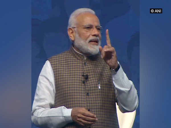 Prime Minister Narendra Modi speaking at 'Mai Bhi Chowkidar' programme in New Delhi on Sunday. Photo/ANI