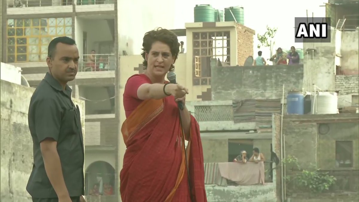 Congress General Secretary Priyanka Gandhi Vadra addressing a roadshow in Delhi.