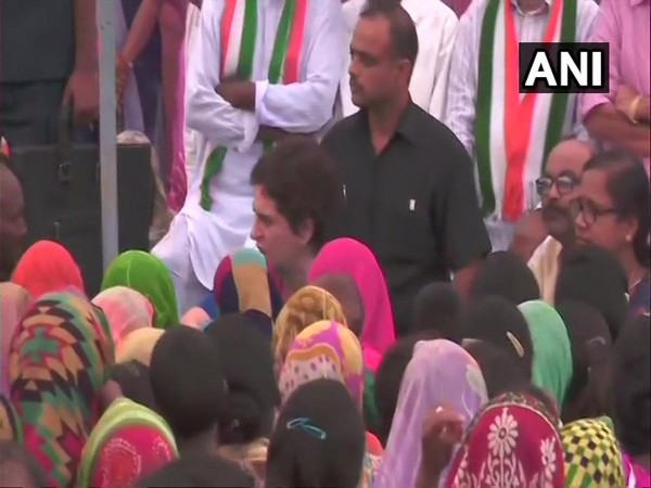 Congress leader Priyanka Gandhi Vadra meeting families of the Sonbhadra massacre victims on Tuesday. (Photo/ANI)