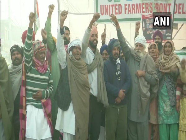 Farmers protesting against new farm laws at Tikri border. (Photo/ANI)