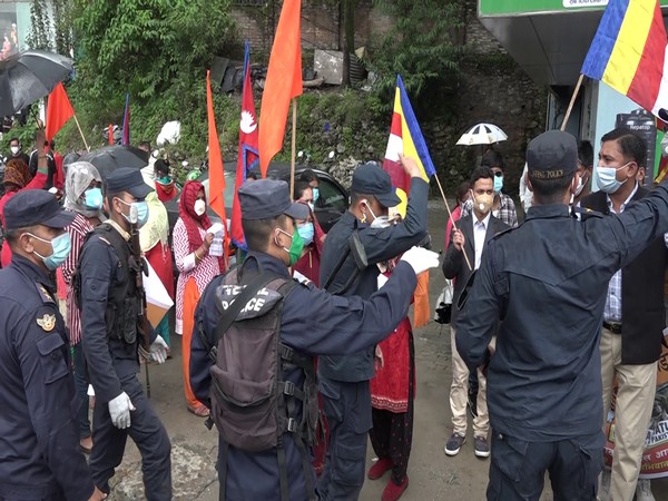 Police controlling the protestors outside the Pakistan Embassy in Kathmandu on Friday