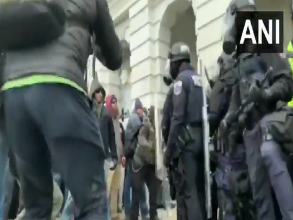 Protesters clash with police outside the US Capitol in Washington (Photo/ANI)