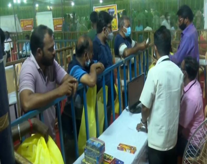 Puducherry residents queuing up for purchasing firecrackers. (Photo/ANI)