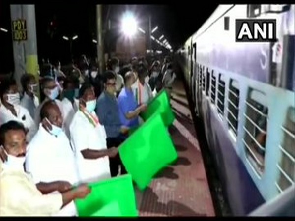 Chief Minister V Narayanasamy along with other flagged off the Shramik Special train on Thursday. Photo/ANI
