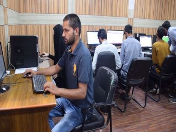 Students availing the faclities at the internet facilitaiton centre in Pulwama. Photo/ANI