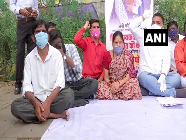 Kin of a 33-year-old woman patient, who allegedly went missing from a COVID-19 jumbo hospital, staged protest in Pune. (Photo/ANI)