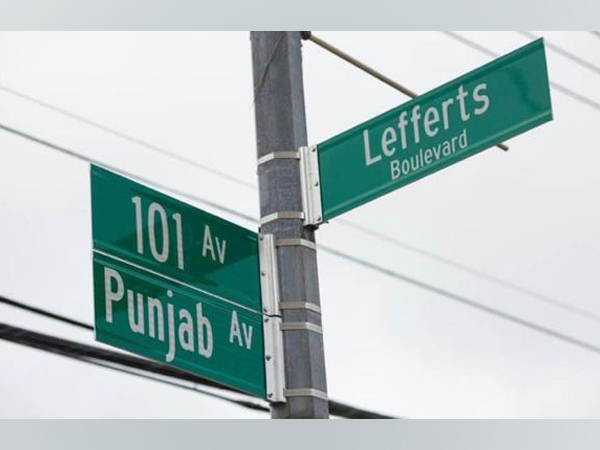 Street sign of Punjab Avenue at the intersection of Lefferts Boulevard and 101 Avenue