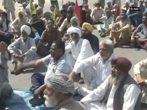 Farmers union staging a sit-in protest on Tuesday over the suicide of a farmer in Punjab. Photo: ANI.
