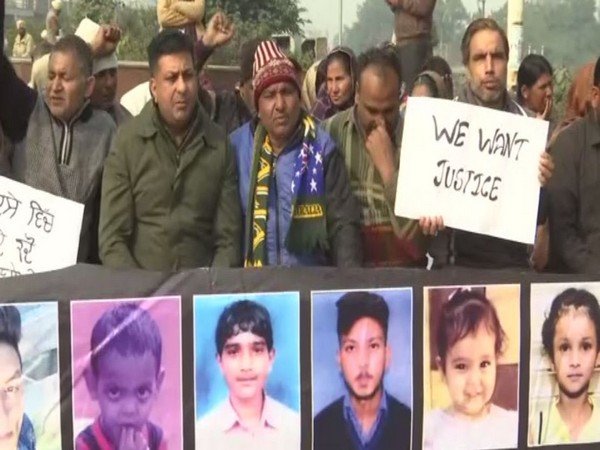 Families of the victims of last year's train incident, protesting in Amritsar on Tuesday. Photo/ANI