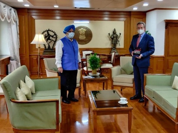 Australian High Commissioner to India Barry O'Farrel with Civil aviation minister Hardeep Singh Puri at his office on Friday