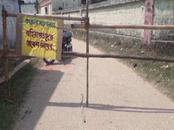 Entrance to a village in Purulia district has been blocked and a sign reading - Outsiders are barred from entering the area in the wake of coronavirus - has been put up. Photo/ANI