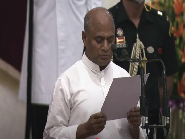 Rajya Sabha MP Ram Chandra Prasad Singh taking oath as Union Minister at Rashtrapati Bhavan.