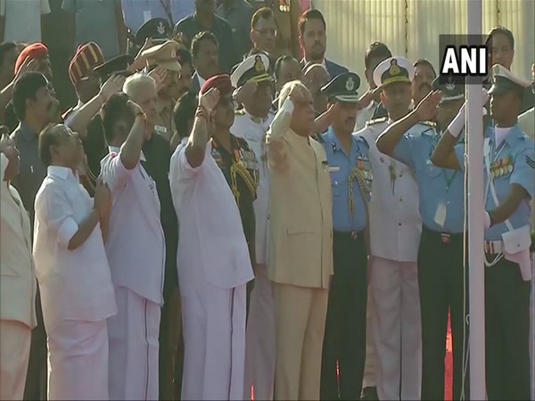 Tamil Nadu Governor Banwarilal Purohit unfurls the national flag in Chennai on Republic Day, CM Edappadi K. Palaniswami and Deputy Chief Minister O Panneerselvam also present
